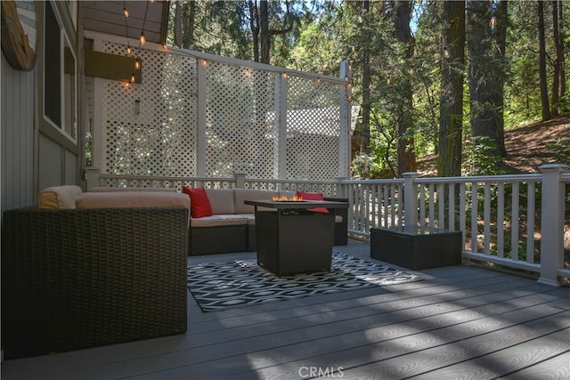 deck featuring an outdoor living space