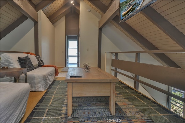 living area with lofted ceiling with beams and wood ceiling