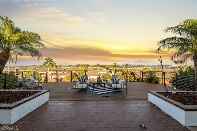 patio terrace at dusk with outdoor lounge area