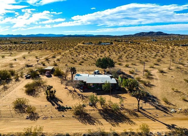 birds eye view of property featuring a rural view and a mountain view