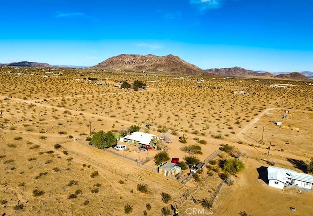 drone / aerial view featuring a mountain view