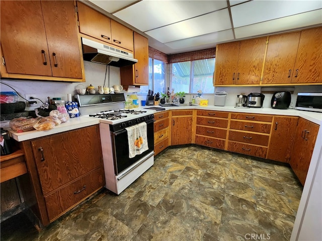 kitchen featuring white gas range oven