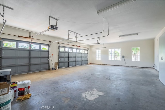 garage featuring a garage door opener