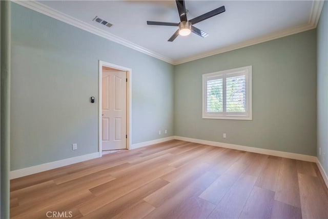 empty room with crown molding, ceiling fan, and light hardwood / wood-style floors