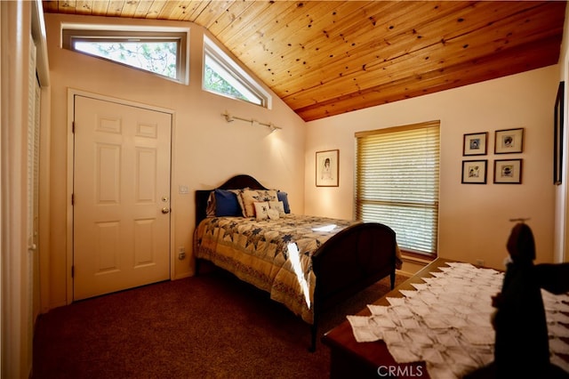 bedroom featuring dark carpet, vaulted ceiling, and wooden ceiling