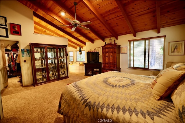 bedroom with lofted ceiling with beams, wood ceiling, light colored carpet, a spacious closet, and ceiling fan