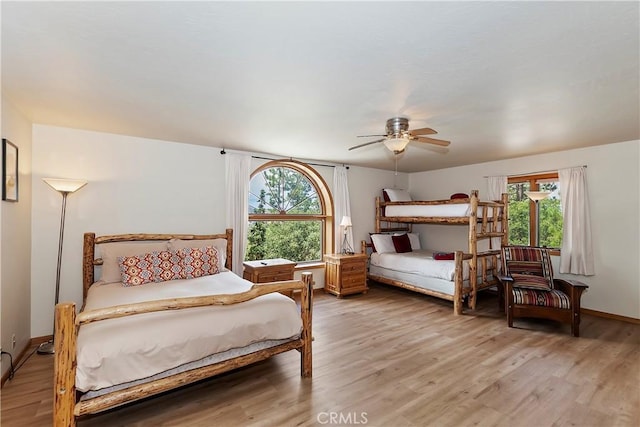 bedroom featuring ceiling fan and wood-type flooring