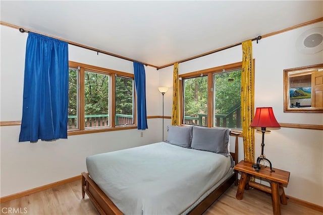 bedroom featuring light hardwood / wood-style floors