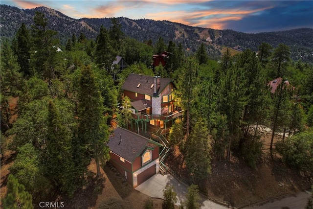 aerial view at dusk with a mountain view