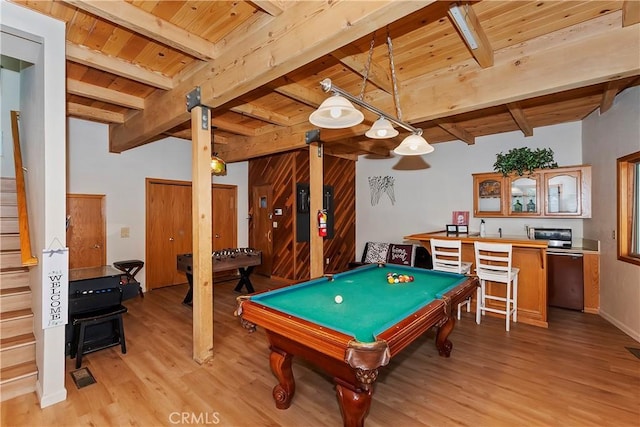 recreation room featuring wood ceiling, beamed ceiling, and light wood-type flooring