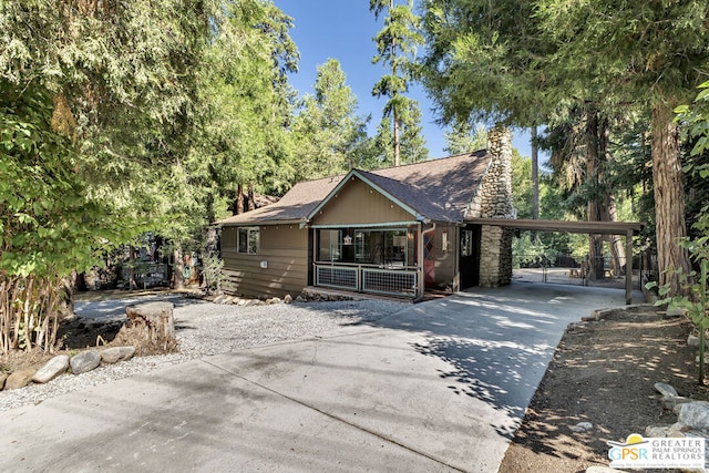 view of front of home with a carport