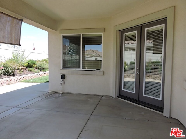 doorway to property featuring a patio