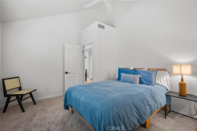 carpeted bedroom featuring vaulted ceiling and ceiling fan