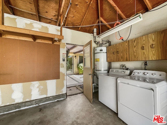 laundry room featuring strapped water heater and separate washer and dryer