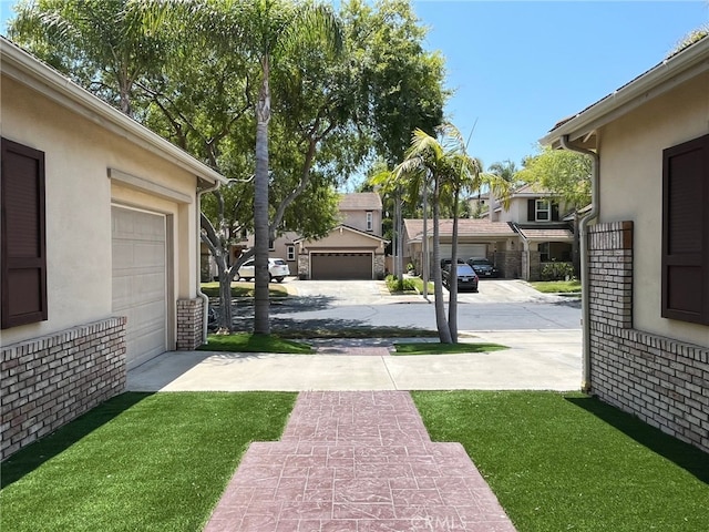 view of yard with a garage