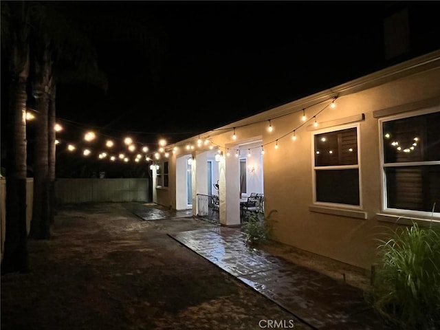 view of patio at twilight