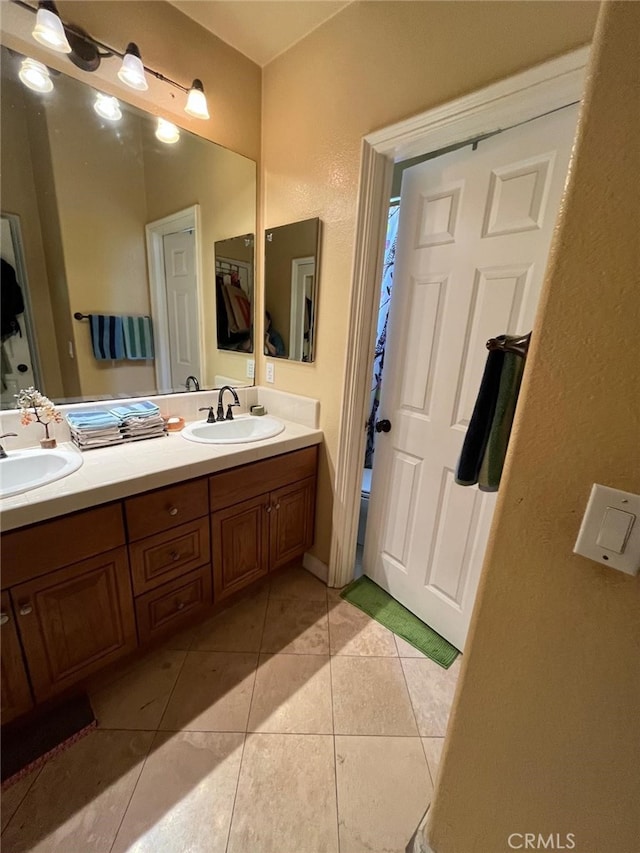 bathroom with vanity and tile patterned floors