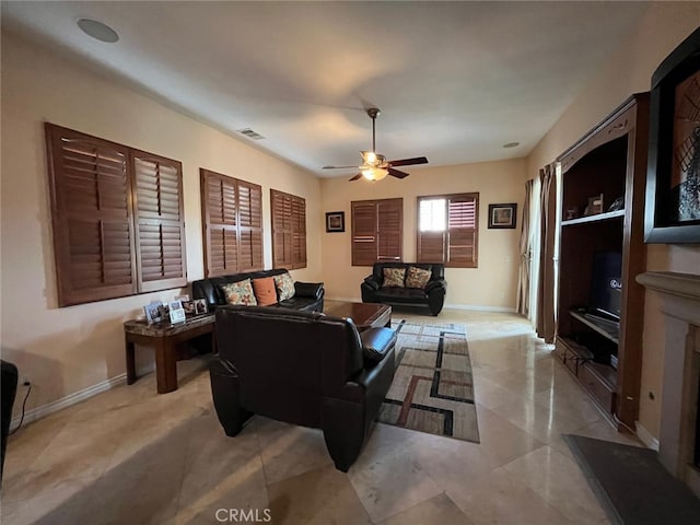 living room with ceiling fan