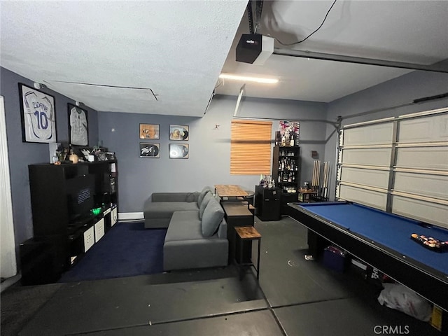 game room featuring a textured ceiling, billiards, and concrete floors