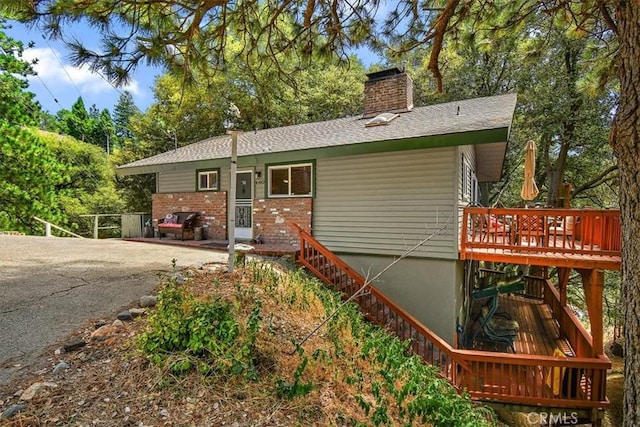 view of front of property with a deck