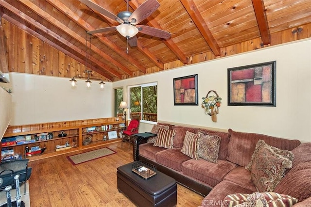 living room featuring light wood-type flooring, ceiling fan, wood ceiling, and vaulted ceiling with beams