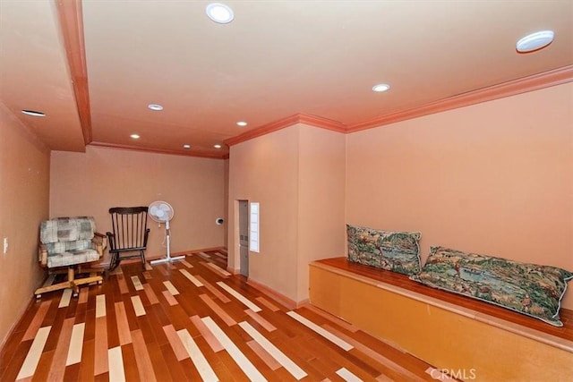 unfurnished room with wood-type flooring and ornamental molding