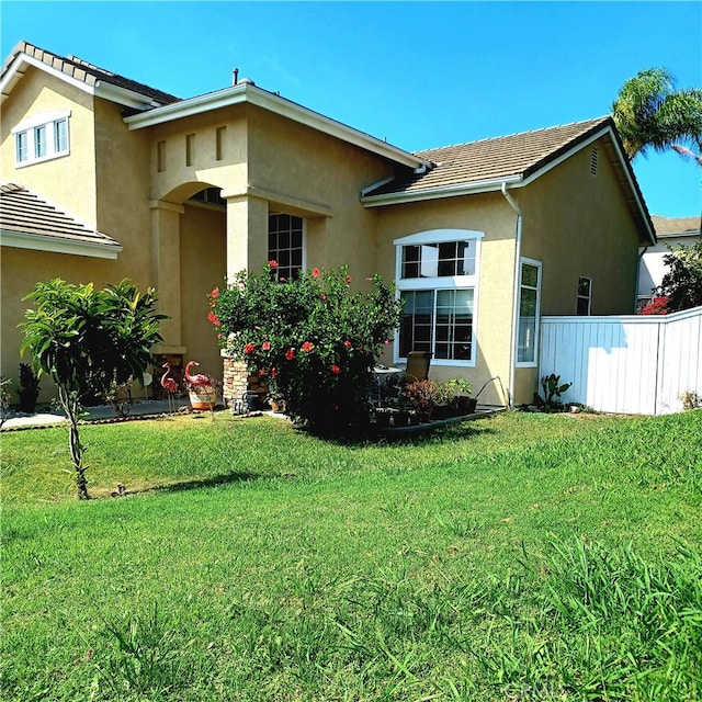 exterior space with a lawn