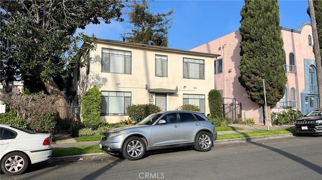 view of property featuring stucco siding