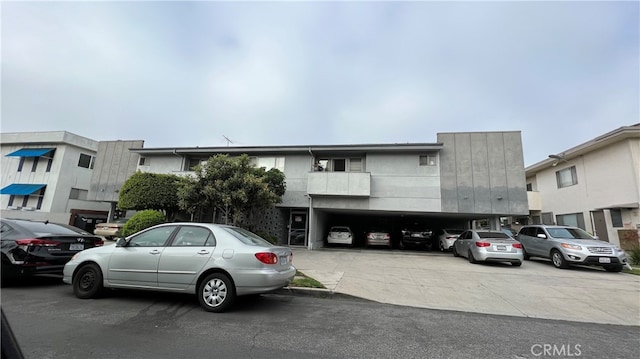 view of building exterior with a carport