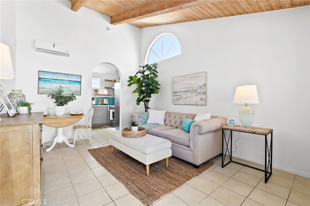 living room featuring light tile patterned flooring, high vaulted ceiling, beamed ceiling, a wall mounted AC, and wood ceiling