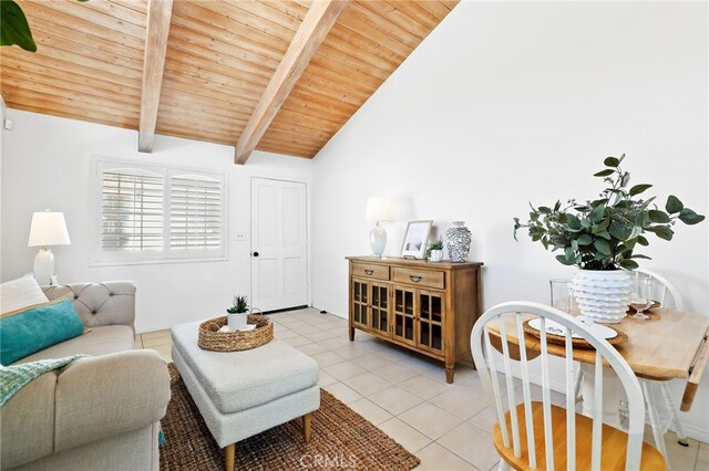 living room with light tile patterned floors, wood ceiling, high vaulted ceiling, and beamed ceiling