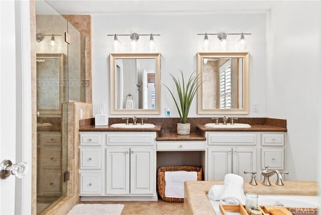 bathroom with vanity and an enclosed shower