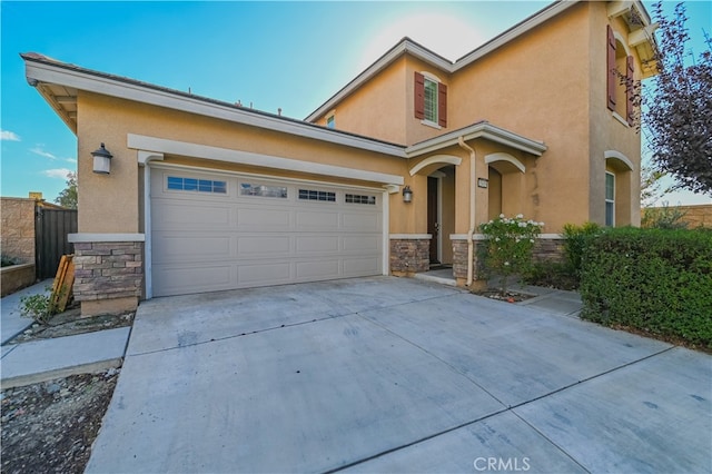 view of front of property featuring a garage