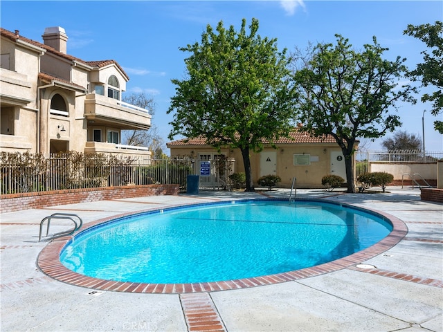 view of pool featuring a patio area