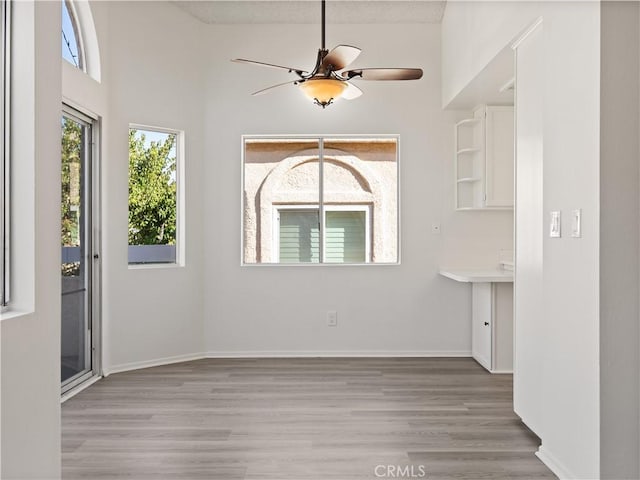 19810 Sandpiper Pl Unit 22, Newhall, CA 91321 - interior space with ceiling fan, baseboards, and light wood-style floors