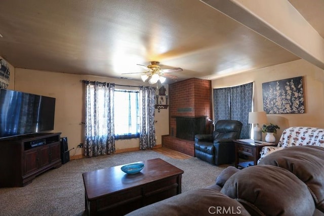 living room with ceiling fan, light colored carpet, and a brick fireplace