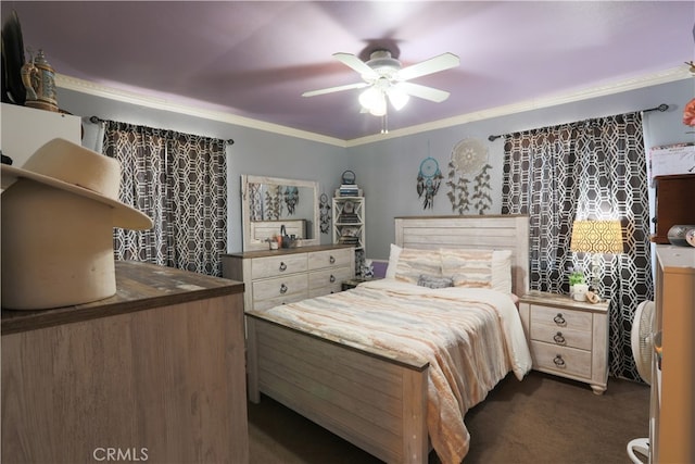 carpeted bedroom featuring ceiling fan and crown molding