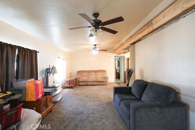 carpeted living room featuring ceiling fan