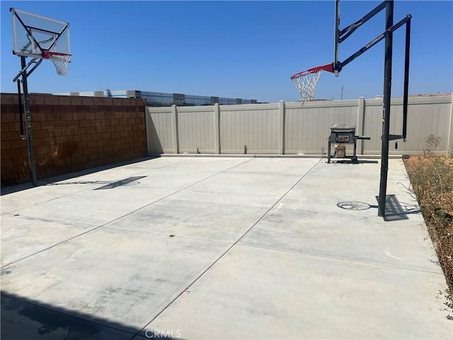 exterior space with basketball court