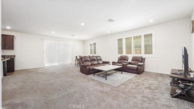 5345 Blue Ridge Way, Fontana, CA 92336 - living area with light colored carpet, visible vents, and recessed lighting
