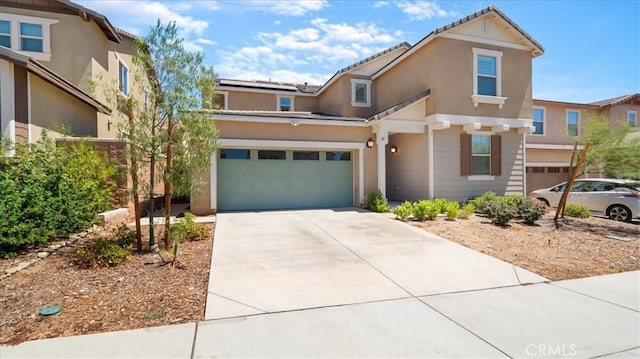 view of front of property with a garage