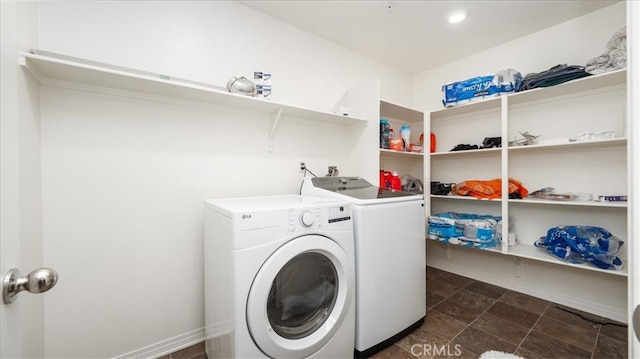 laundry room featuring washing machine and dryer