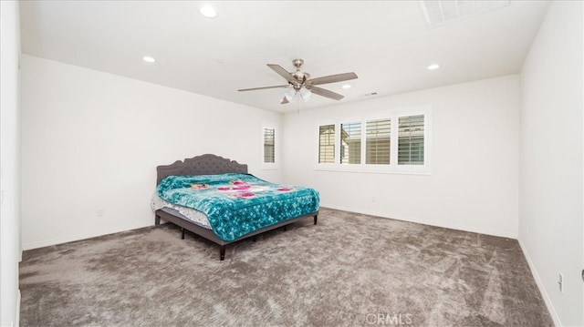 bedroom with ceiling fan and carpet flooring