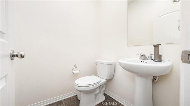 5345 Blue Ridge Way, Fontana, CA 92336 - half bathroom with toilet and baseboards