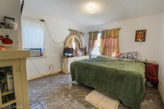 bedroom featuring a textured ceiling