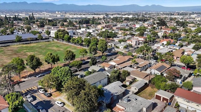 birds eye view of property featuring a residential view and a mountain view