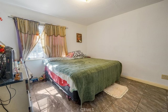 bedroom with baseboards