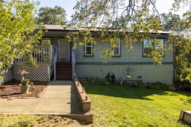 view of front of home with a front yard