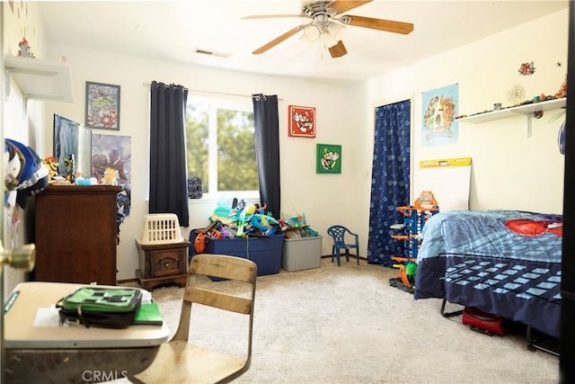 carpeted bedroom with ceiling fan