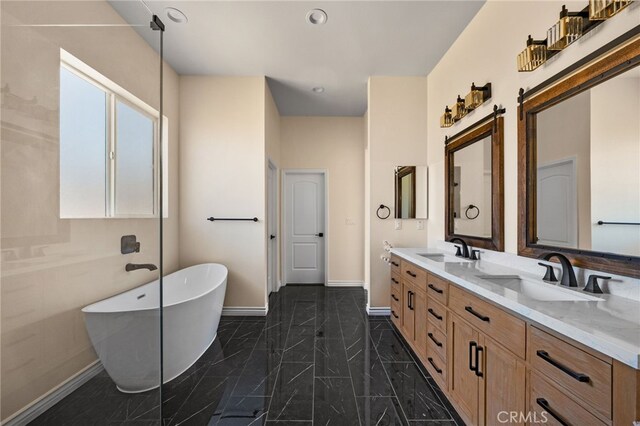 bathroom with a bathtub and vanity